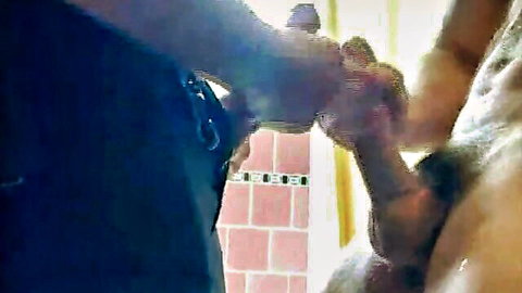 Hand spreading muscular man's hairy ass cheeks as thick erect cock aims for anal penetration in shower