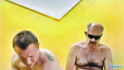 Hairy grandpa in sunglasses with tattooed guy in gay hardcore scene
