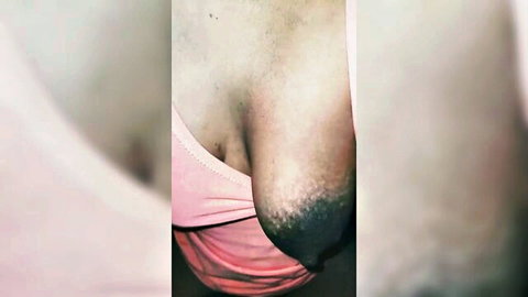 South Asian MILF's huge natural tits spilling out of tight pink bra cleavage