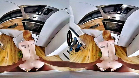 Naked redhead with tattoos squats spreading shaved pussy and ass in kitchen fisheye view