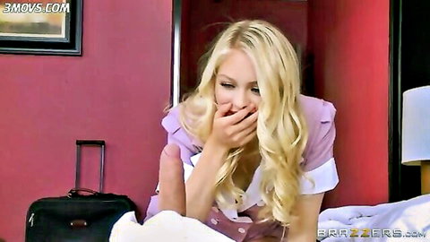 Blonde hotel maid Alli Rae laughing in purple uniform on bed