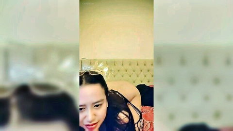 Indonesian amateur in red lingerie teasing from behind on bed