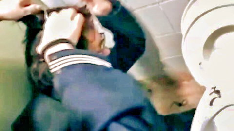 Blurry POV of Asian schoolgirl in sailor uniform sucking thick cock near toilet in bathroom