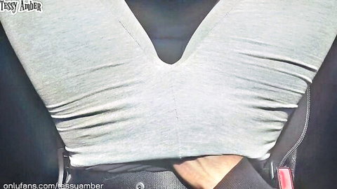 Woman in tight gray leggings with visible camel toe in Uber car seat