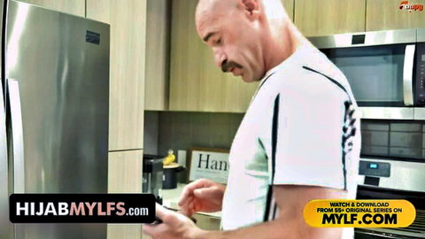 Bald mustached man in kitchen with phone - Brianna Bourbon Mylf scene