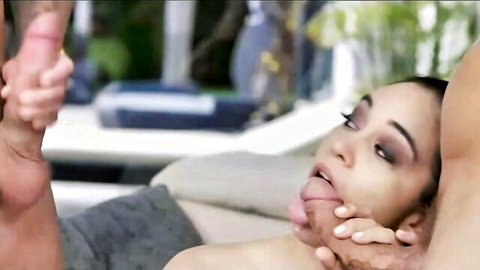 Skinny brunette sucking thick cock poolside with leg held up high
