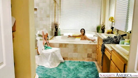 Brunette MILF with huge wet tits lounging nude in bubble bath seductively
