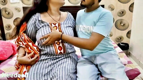 Indian man gropes mature woman's tits over saree blouse in homemade bedroom