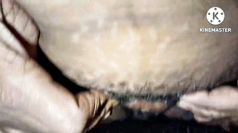 Pale hand spreading plump wet pussy lips exposing pink vagina closeup