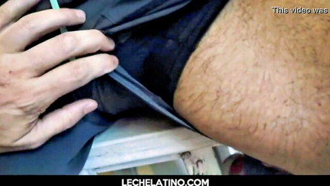 Hairy Latino DILF pulls aside black underwear exposing thick uncut cock