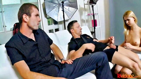 Naked blonde babe penetrated in threesome with two clothed men on couch