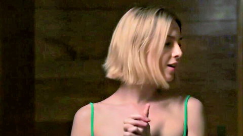 Petite blonde Alecia Fox teases in green slip, finger to lips