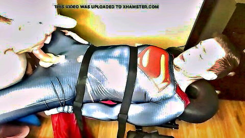 Bound twink in Superman suit strapped down and milked to cum