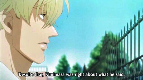 Blond anime yaoi male character in serious side profile outdoors