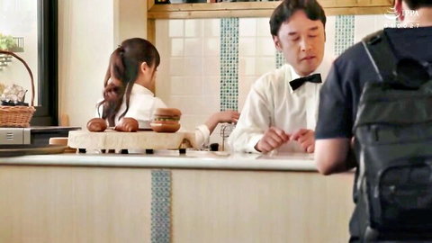 Innocent Asian girl playing with toy food at counter with suited men