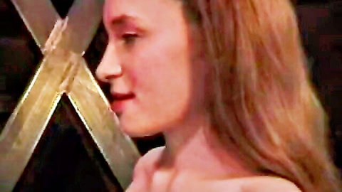Busty redhead mademoiselle spanking slutty MILF in fetish scene