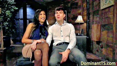 Asian TS woman dominates hunk in intimate clothed tease