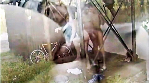 Blurry gay couple fucking outdoors doggy style near bicycle with pants down
