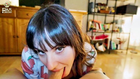 Brunette amateur with bangs licks cock head with tongue out in closeup POV blowjob