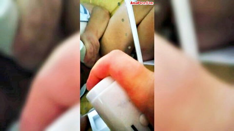 Blurry closeup of Italian amateur solo girl inserting white dildo into wet pussy during masturbation