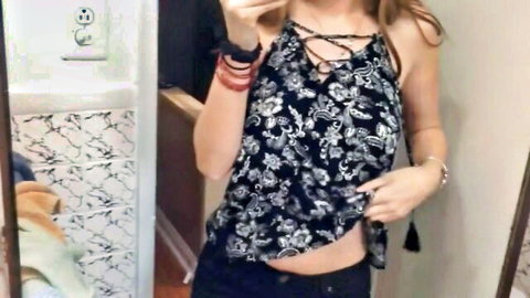 Busty brunette in lace crop top teases in mirror selfie