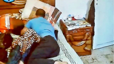 Egyptian couple in hijab engaging in intimate missionary position