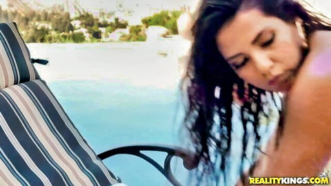 Curvy Latina Rose Monroe teases with wet hair and big booty poolside