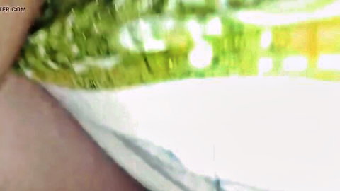 Blurry close-up of Indian bhabhi's lower body in white fabric, steamy desi chudai tease