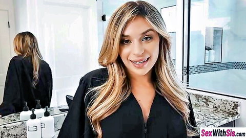 Smiling blonde stepsister in black zip-up top showing cleavage