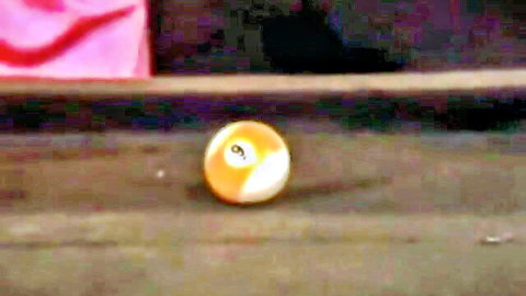 Yellow 9-ball on pool table, teasing classic porn vibe
