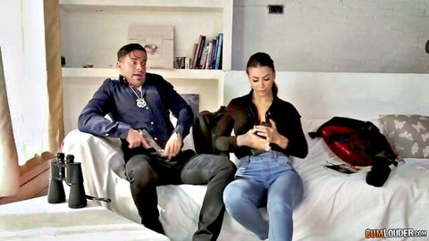 Stunning brunette police officer relaxes with hot male partner on couch