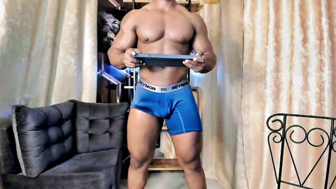 Tayler Waka muscular black hunk posing in tight blue briefs