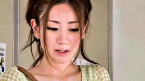 Seductive Asian woman in checkered blouse, subtle expression
