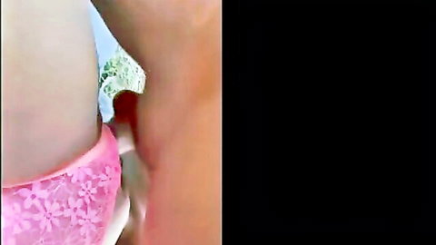 Busty woman exposes huge tits and pulls pink panties aside revealing shaved pussy with thick creampie cum dripping out outdoors.