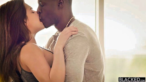 Leah Gotti passionately kissing black stud in intimate embrace