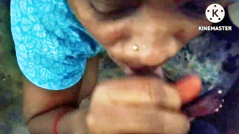 Indian brunette with nose ring sucking thick orange carrot like a cock in teasing blowjob