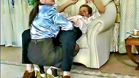 Curvy MILF in shiny blouse seducing older man in chair
