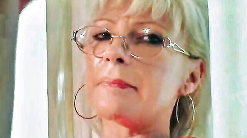 Marcella, blonde mature woman with glasses in kitchen fisting scene