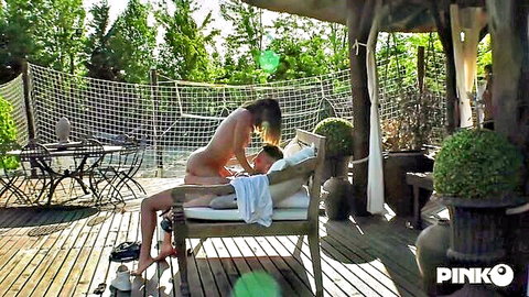 Curvy brunette MILF with big ass and tits rides cock reverse cowgirl outdoors on patio lounge
