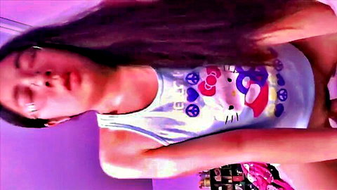 Asian beauty in Hello Kitty tank top cums intensely on big cock