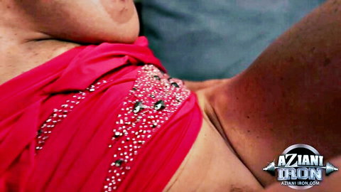 Muscular fair-skinned FBB teases with small tits underboob in sparkly red sari wrap