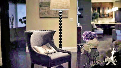 Elegant living room scene with Silvia Saige and Dante Colle in The Devil at My Door