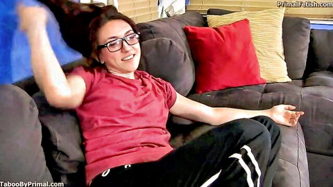 Mandy Muse as geeky brunette sister in glasses, red top, smiling playfully