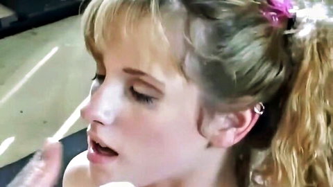Blonde babysitter in ponytail giving intense blowjob close-up