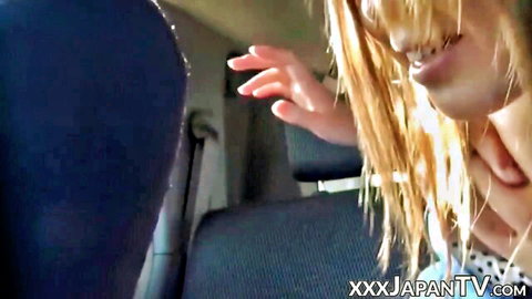 Blonde Asian beauty stretched in ecstasy in car backseat by cameraman