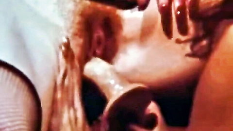 Retro blonde babe deepthroating dildo in vintage xxx scene