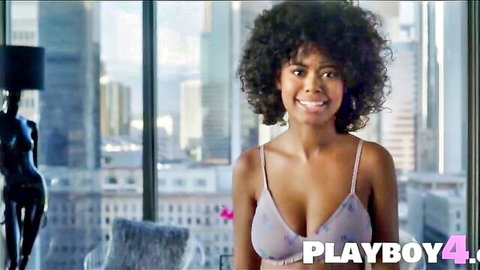Petite ebony teen with huge boobs posing in sexy purple lingerie