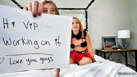 Bryce Adams in black lingerie and red shorts, teasing VIP fans with love sign