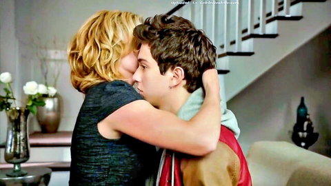 Elisabeth Shue as Mrs. Bender embracing young man intimately