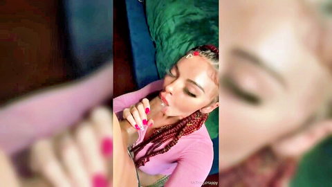 Ms Trigga Happy with red braids sucking cock in pink top close-up